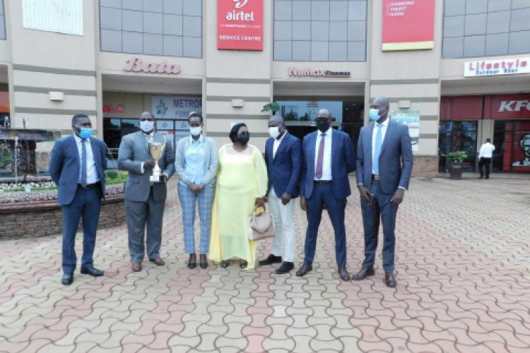 Group Photo of Management with a Board Member